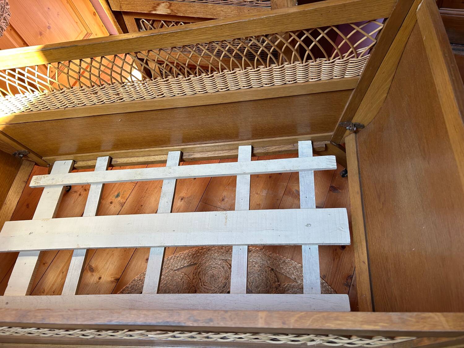 Wooden and rattan children's bed from the 60s