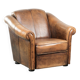 Fauteuil en peau de mouton magnifiquement conçu et confortable, avec un look intemporel et une finition de passepoil assortie.