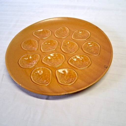 Brown ceramic oyster serving dish in good condition