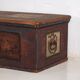 Antique red trunk with floral decoration (c.1920)
