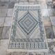 White and blue handwoven rug in natural wool