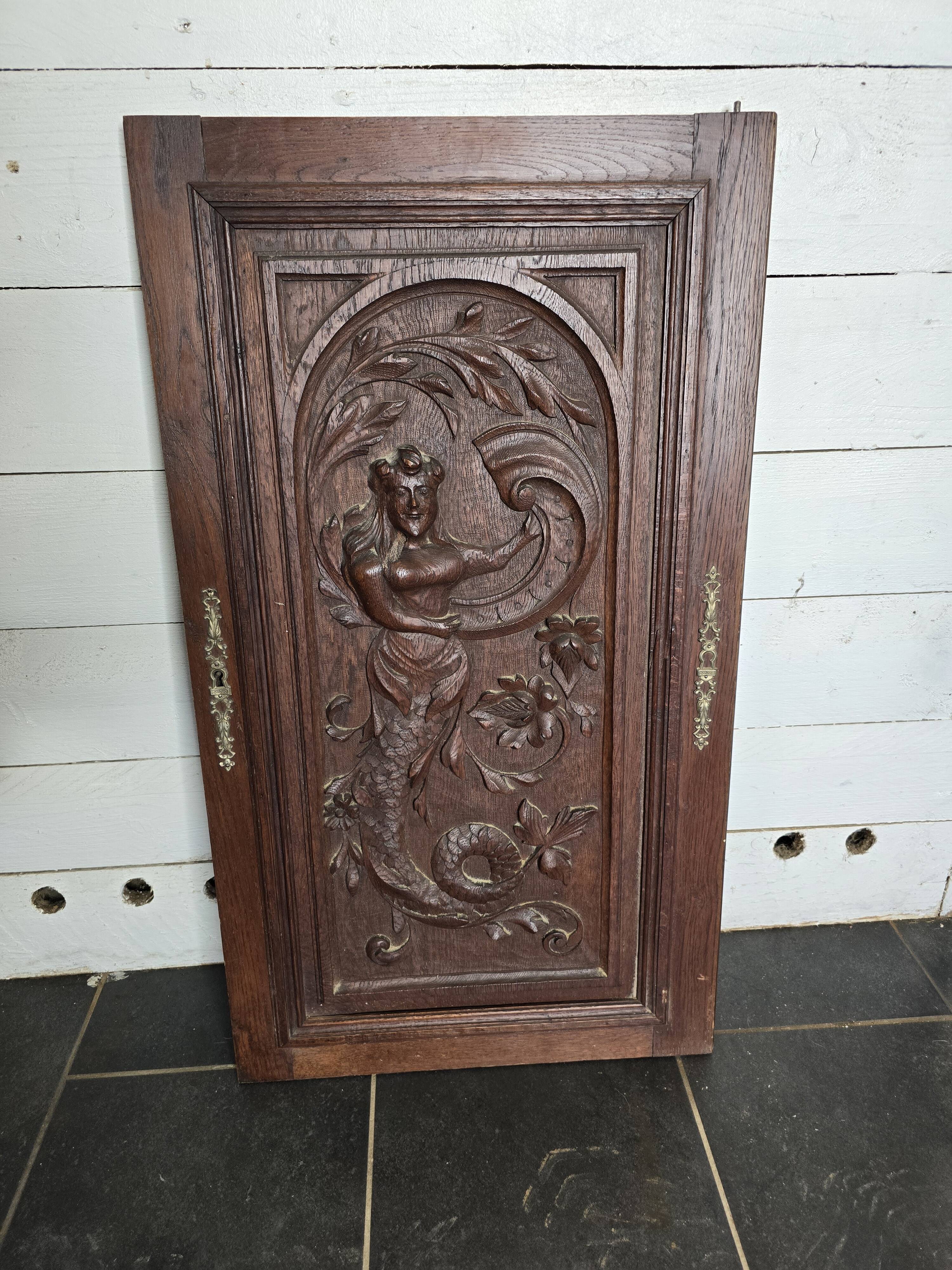 Old carved oak wooden door