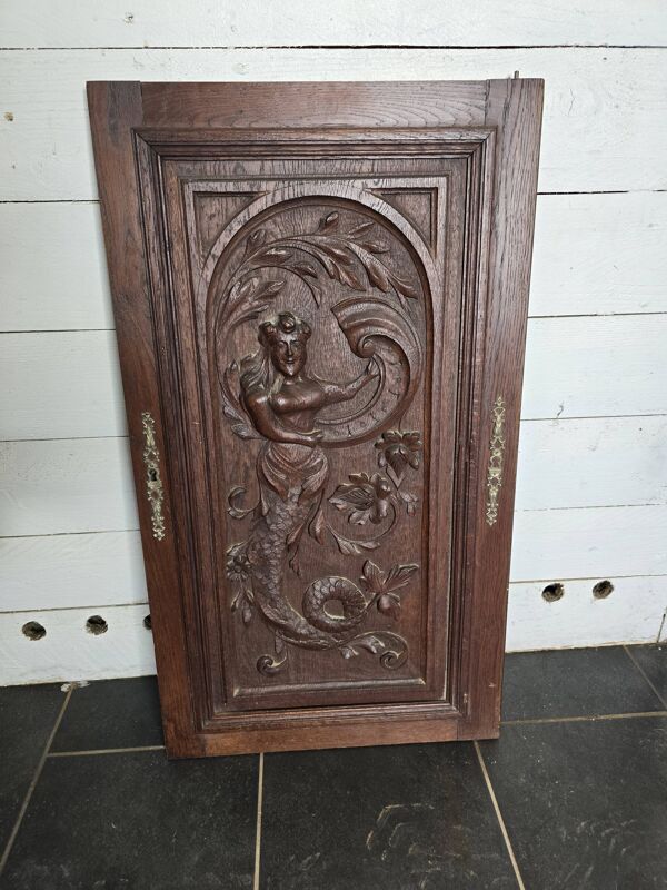 Ancienne porte en bois sculpté en chêne
