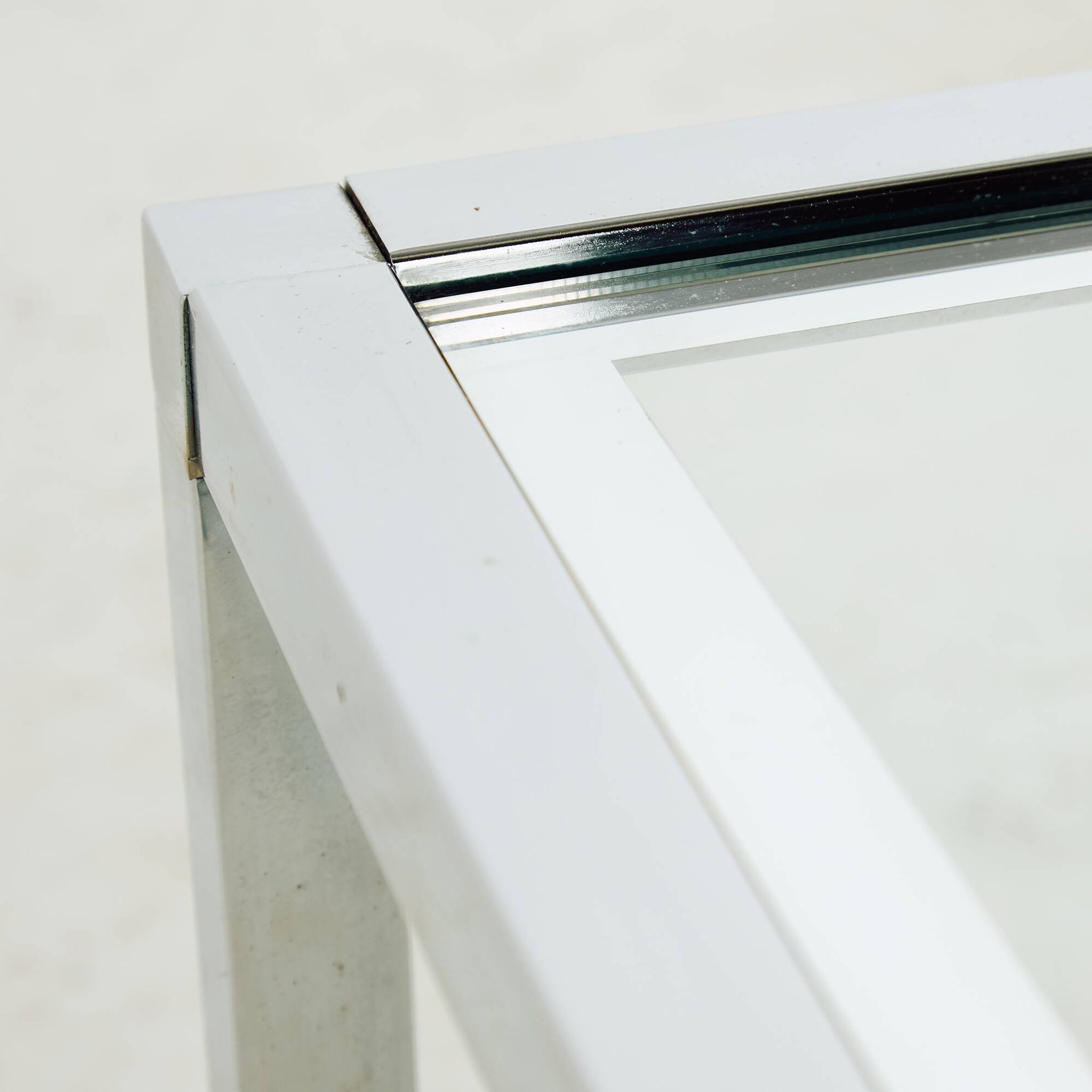 Chrome and glass coffee table.