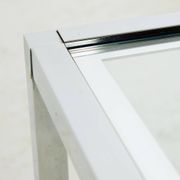 Chrome and glass coffee table.