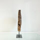 Old decorative wooden wheel on foot