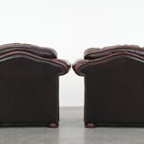 Set of two marbled cowhide leather Chesterfield armchairs in English style
