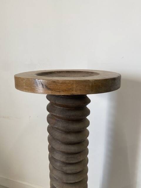 Old wooden press screw, round base