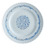 Round antique earthenware dish with floral decoration