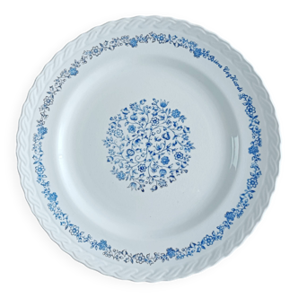 Round antique earthenware dish with floral decoration