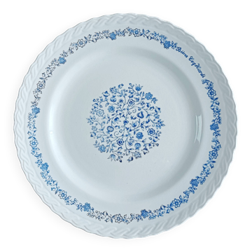 Round antique earthenware dish with floral decoration