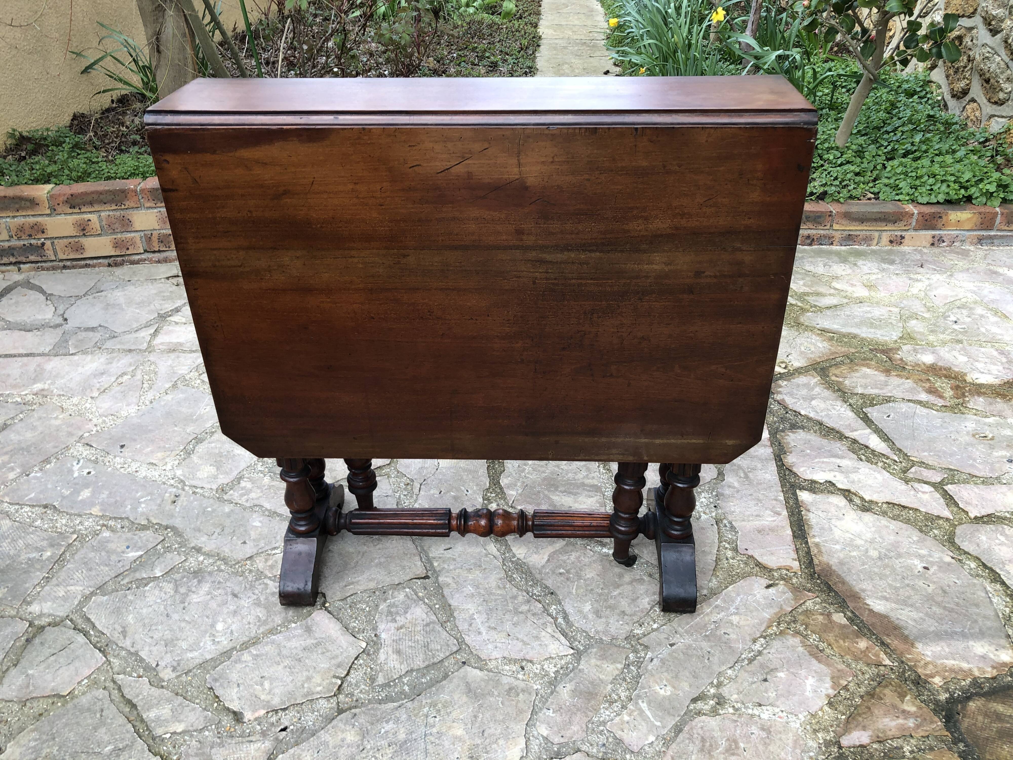 Side table with flaps