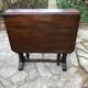 Side table with flaps