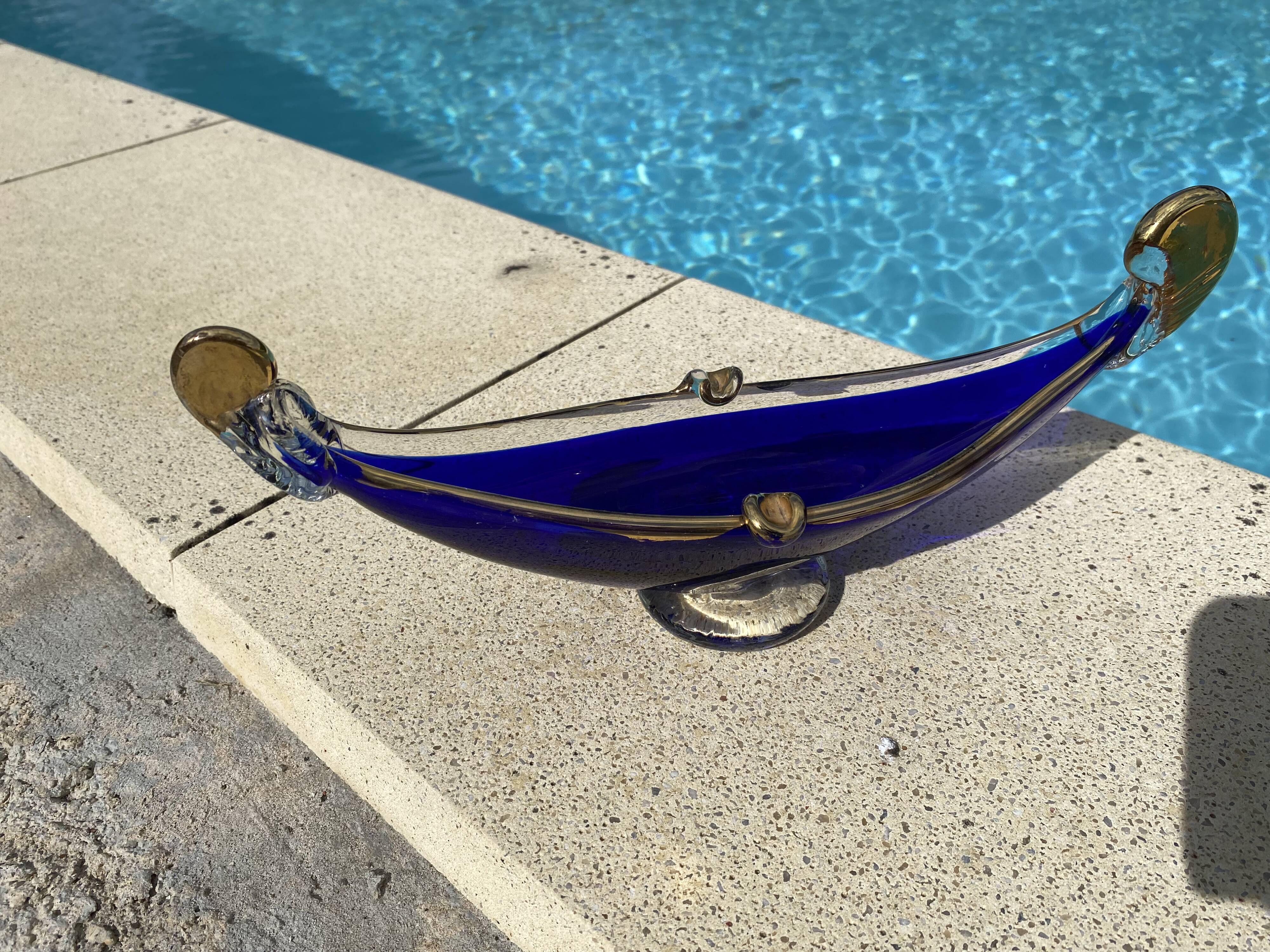 Vintage cobalt blue Murano glass gondola bowl with gilding.