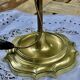 Bronze-gilt bouillotte lamp XIXth century with a tin shade featuring Japonese decoration.