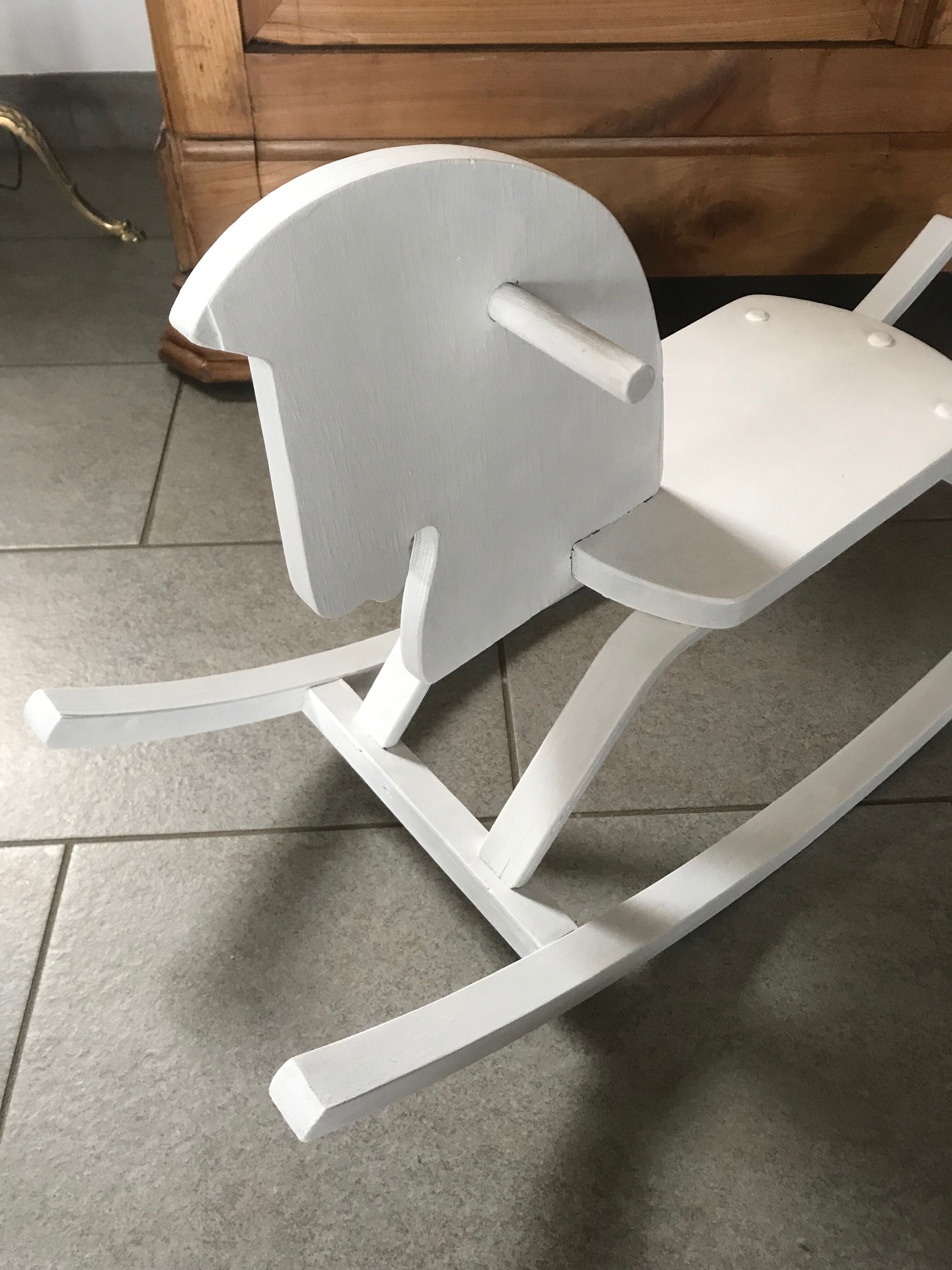White wooden rocking horse