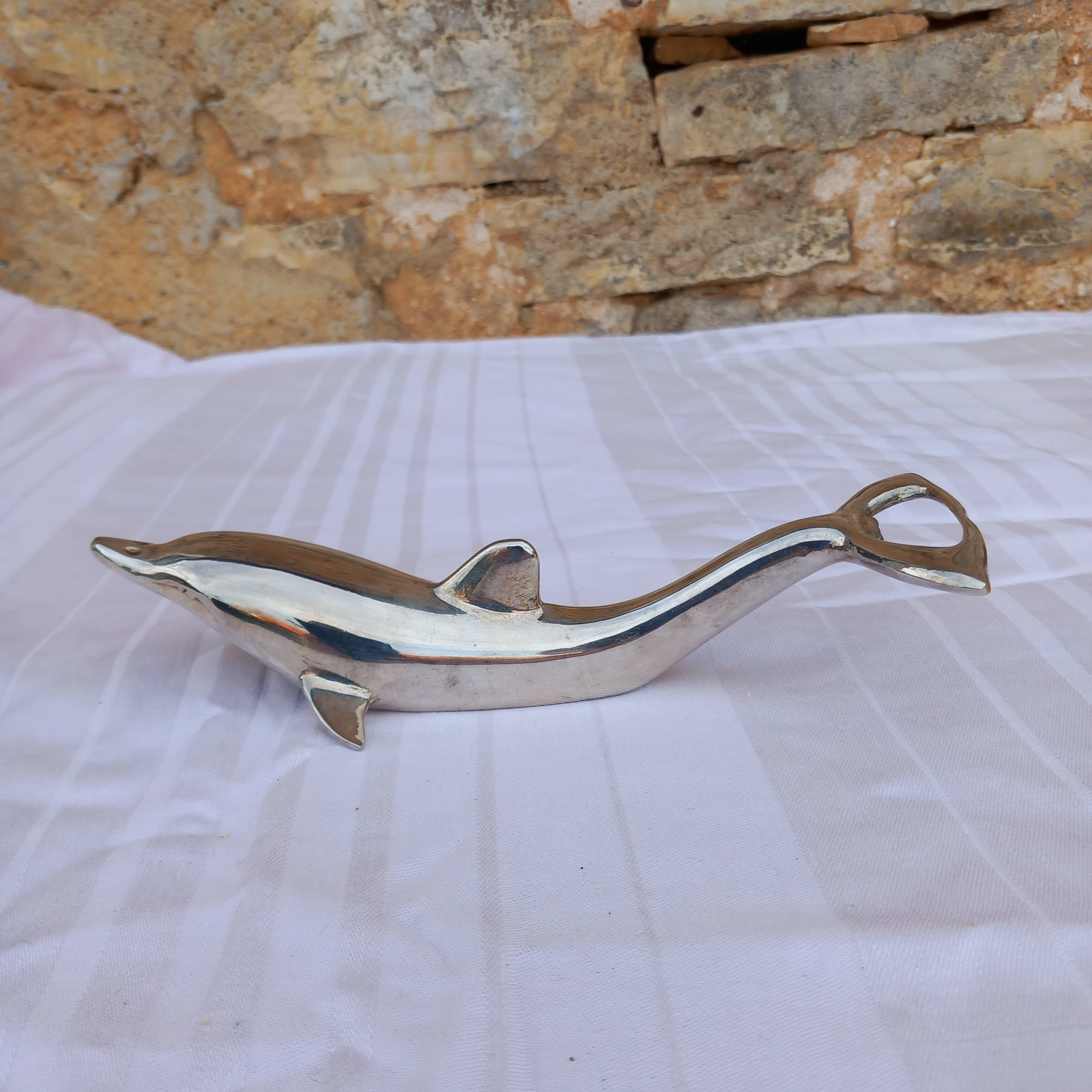 Dolphin bottle opener can opener