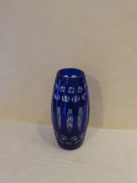 Blue and transparent glass vase, has vintage geometry patterns
