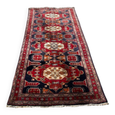 Long antique Persian carpet