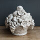Ornamental basket decorated with trompe l'oeil fruits