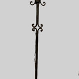 Floor lamp has four wrought iron lights