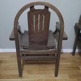 Paire de fauteuils Baumann en hêtre teinté modèle "Argos"