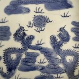 Antique Chinese tea set decorated with dragons.