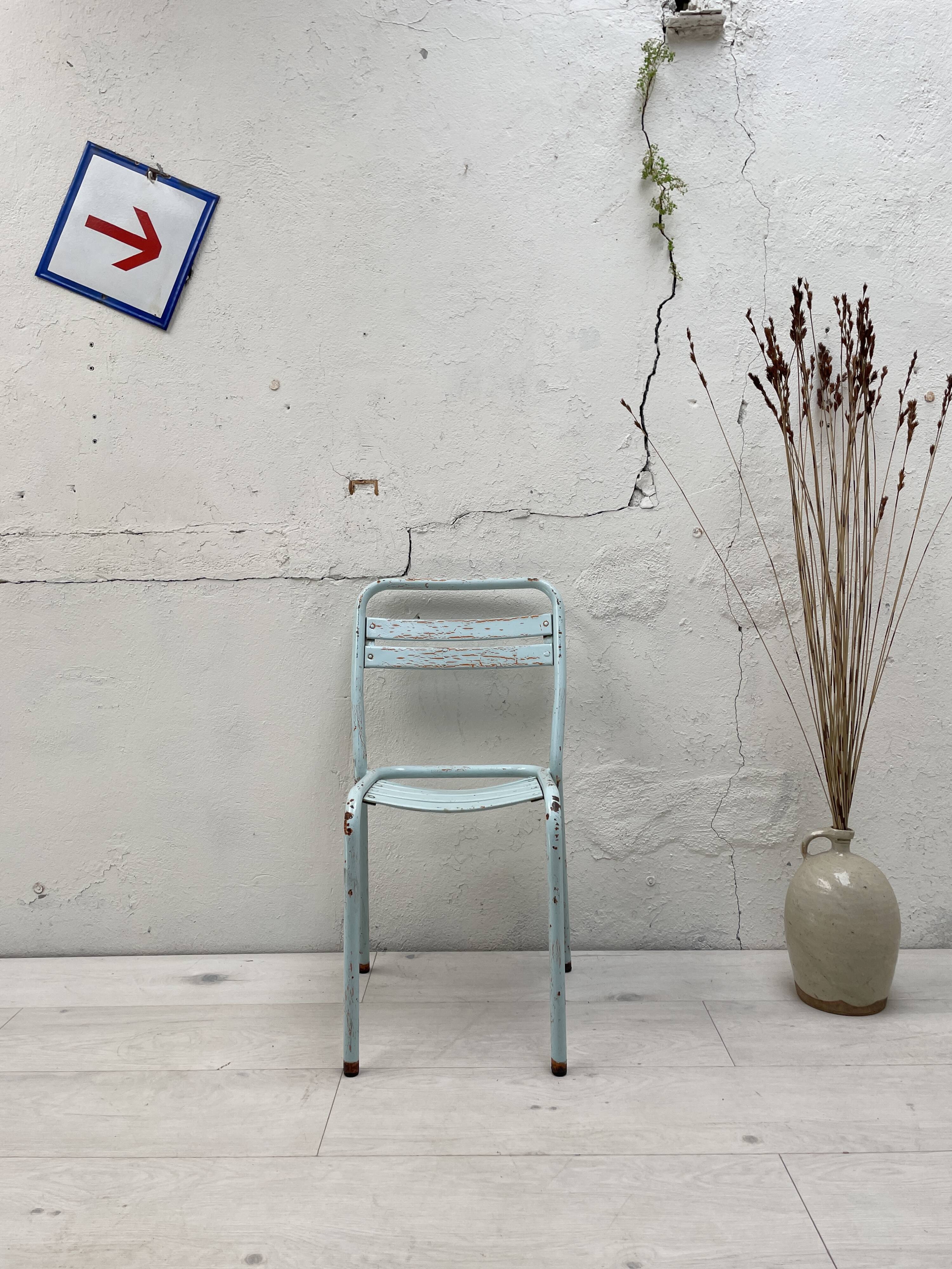 Set of four Tolix T2 chairs, circa 1950.