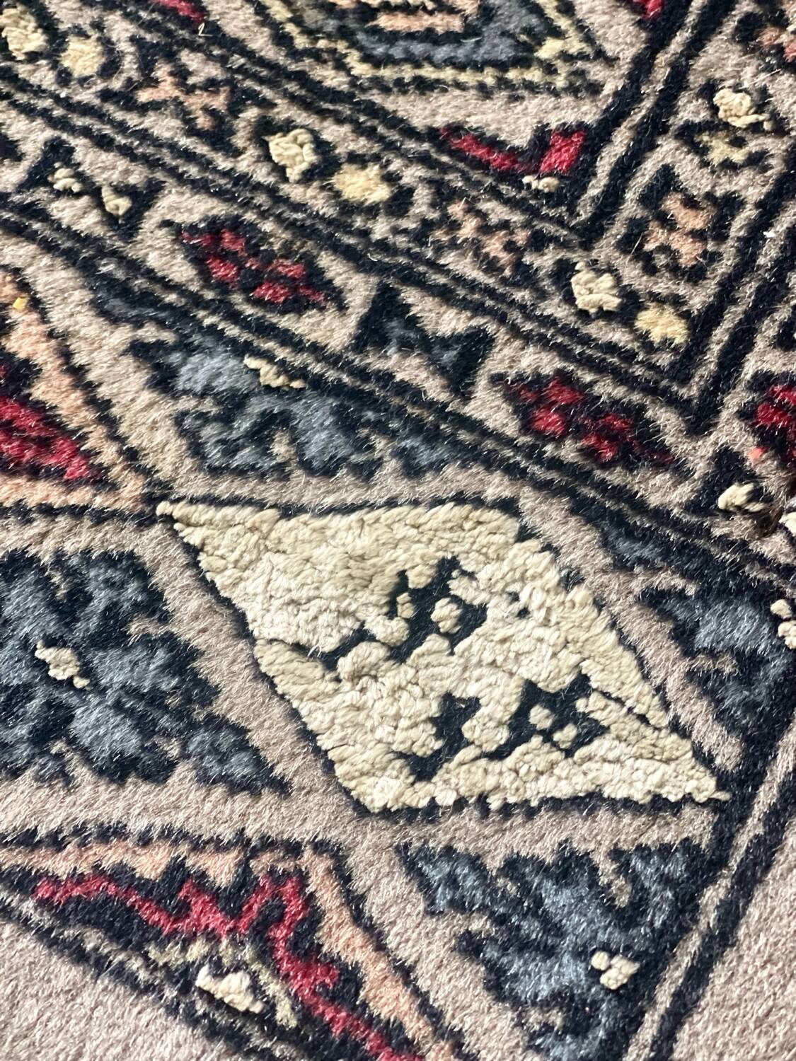 Antique Persian rug, signed.