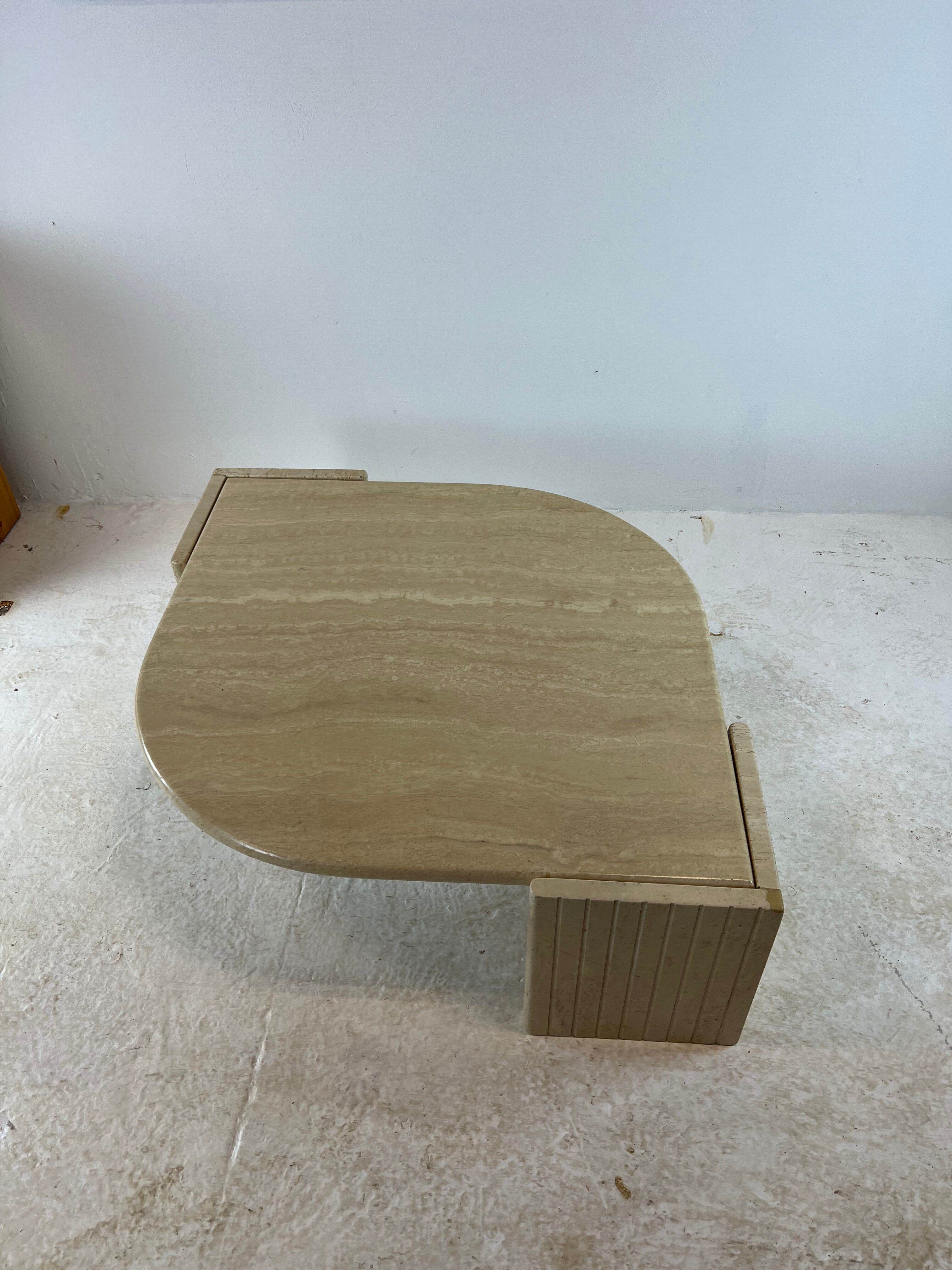 Coffee table Roche Bobois "eye" in travertine, 1970
