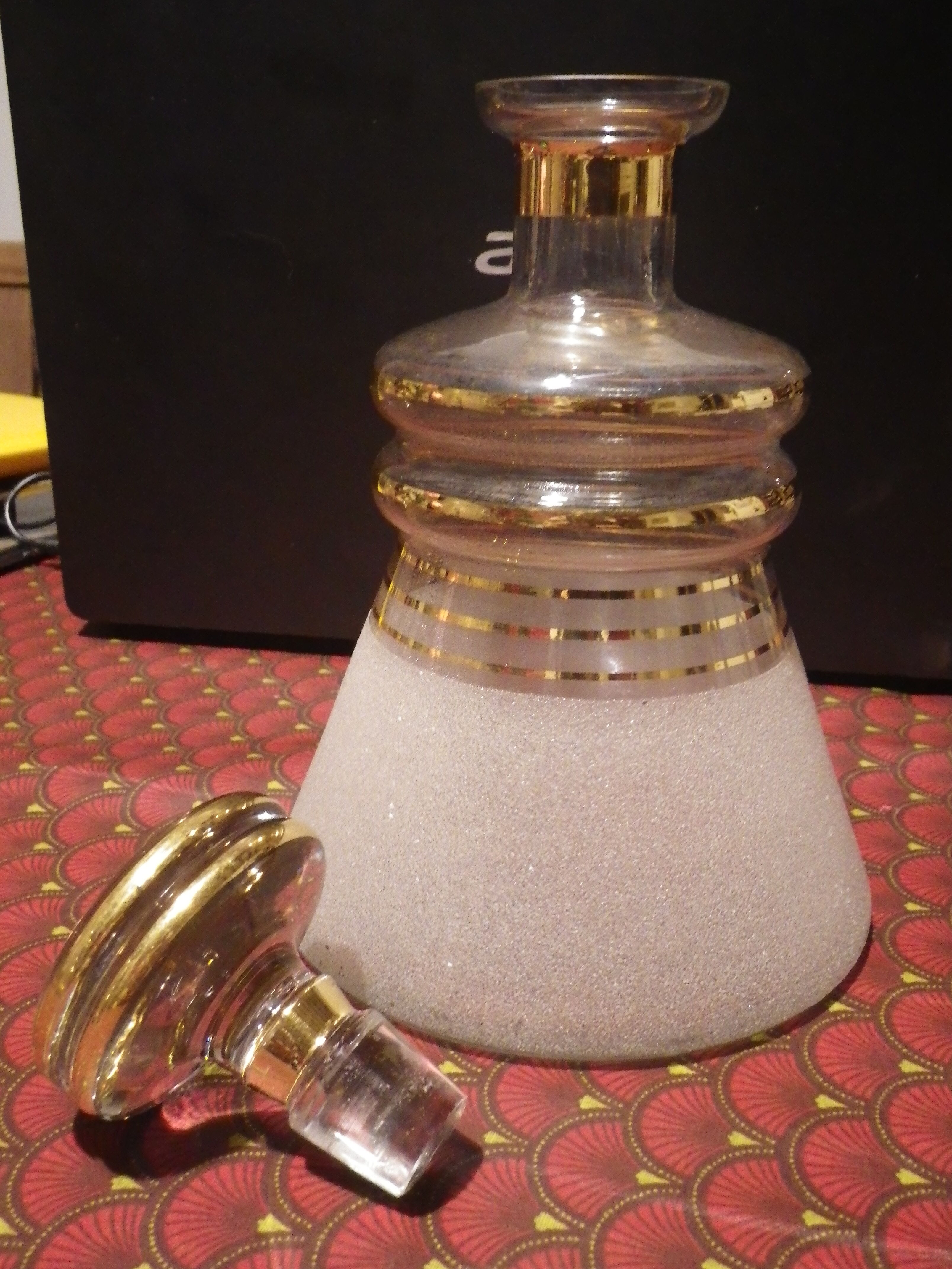 Granite water decanter gilded border