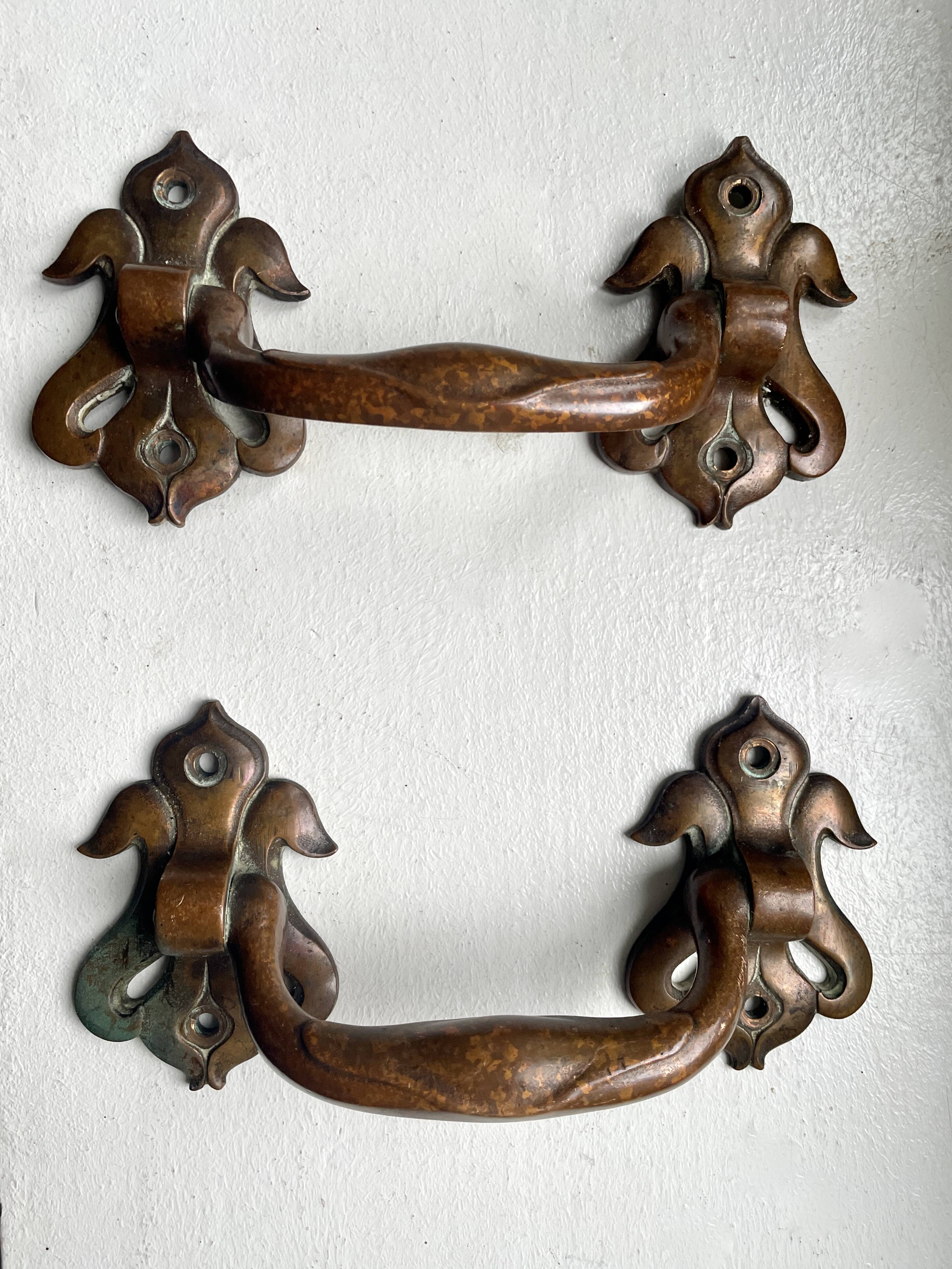 Pair of bronze handles by Emile Muller, 19th century.