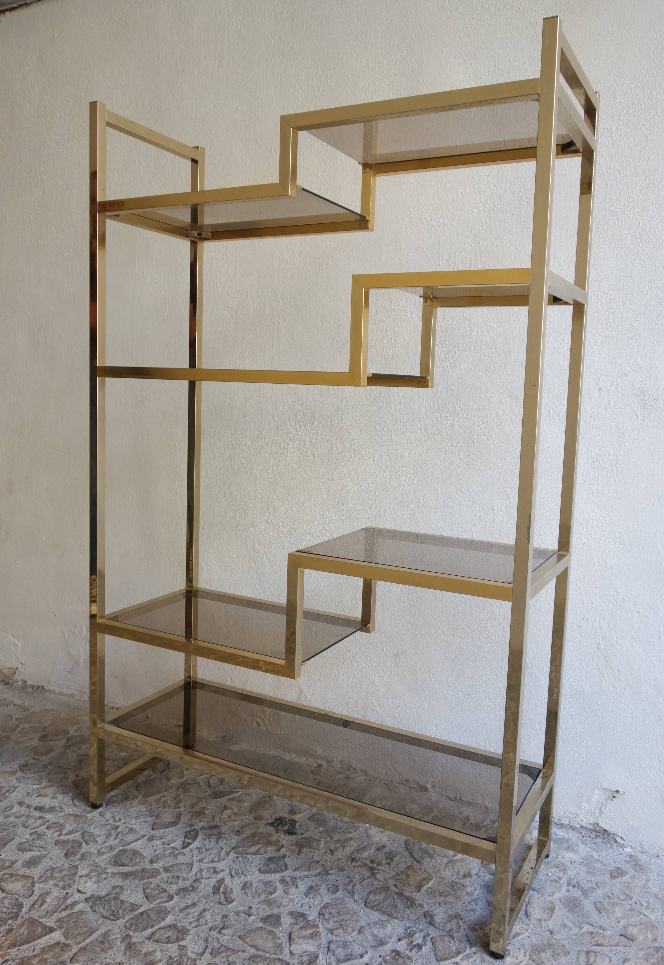 Bookcase or shelf in brass and smoked glass from the 70s