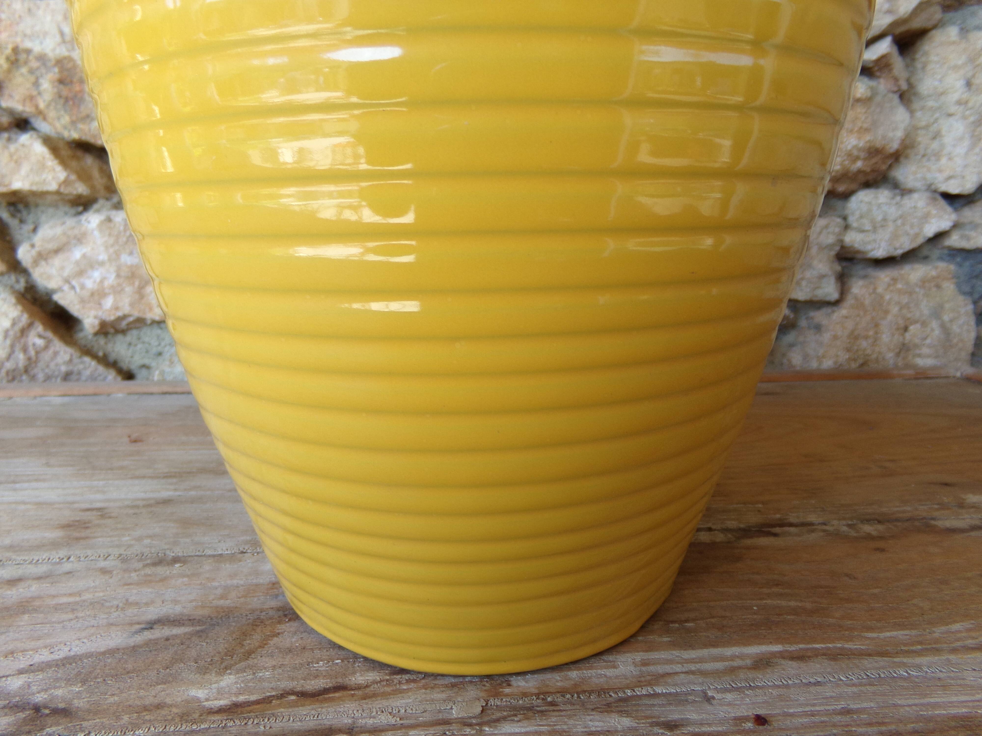 Yellow glazed earth vase