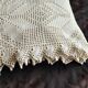 White cotton bedspread, crocheted sofa throw with star patterns