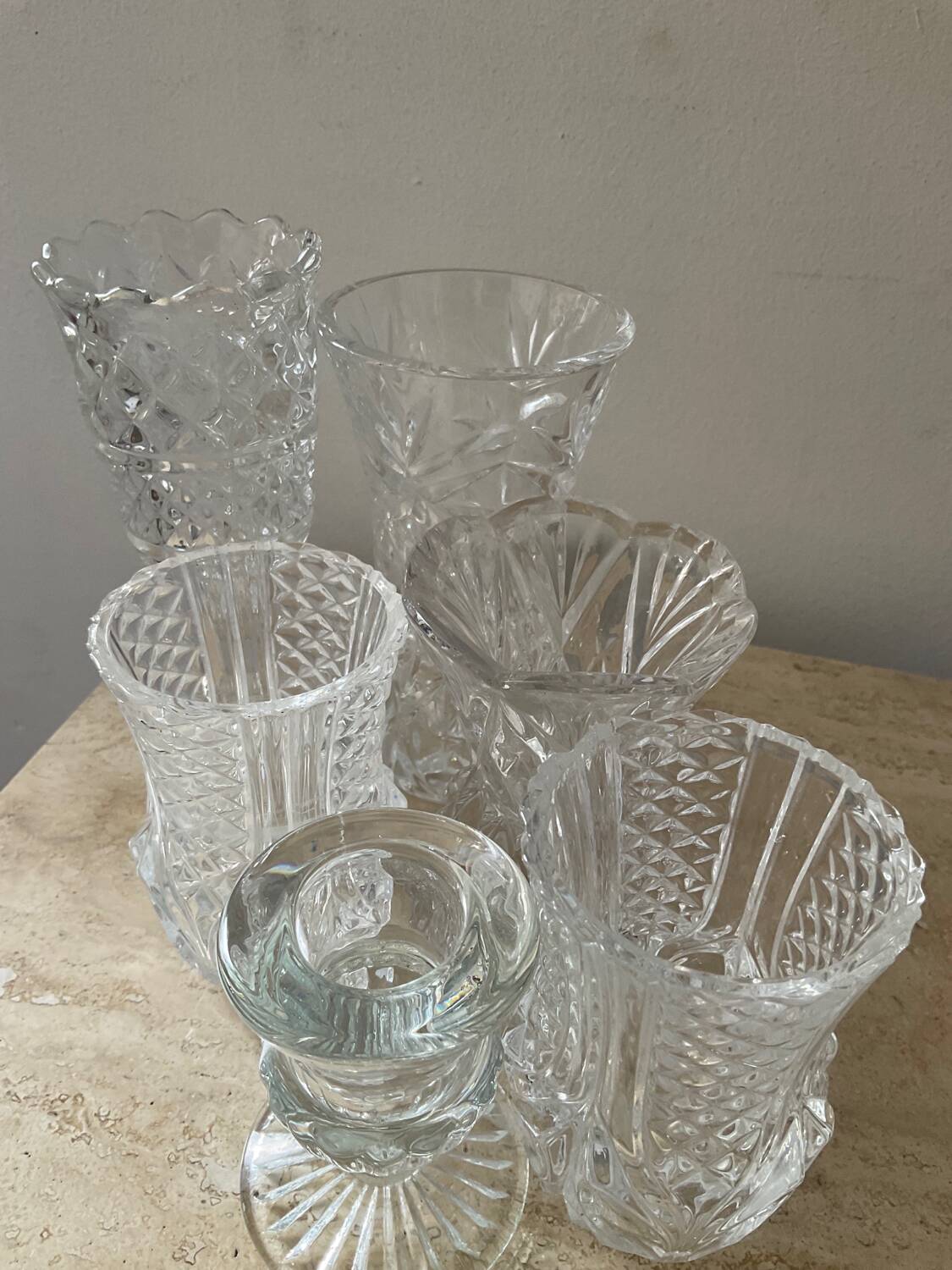 Series of 6 miniature vases in chiseled glass