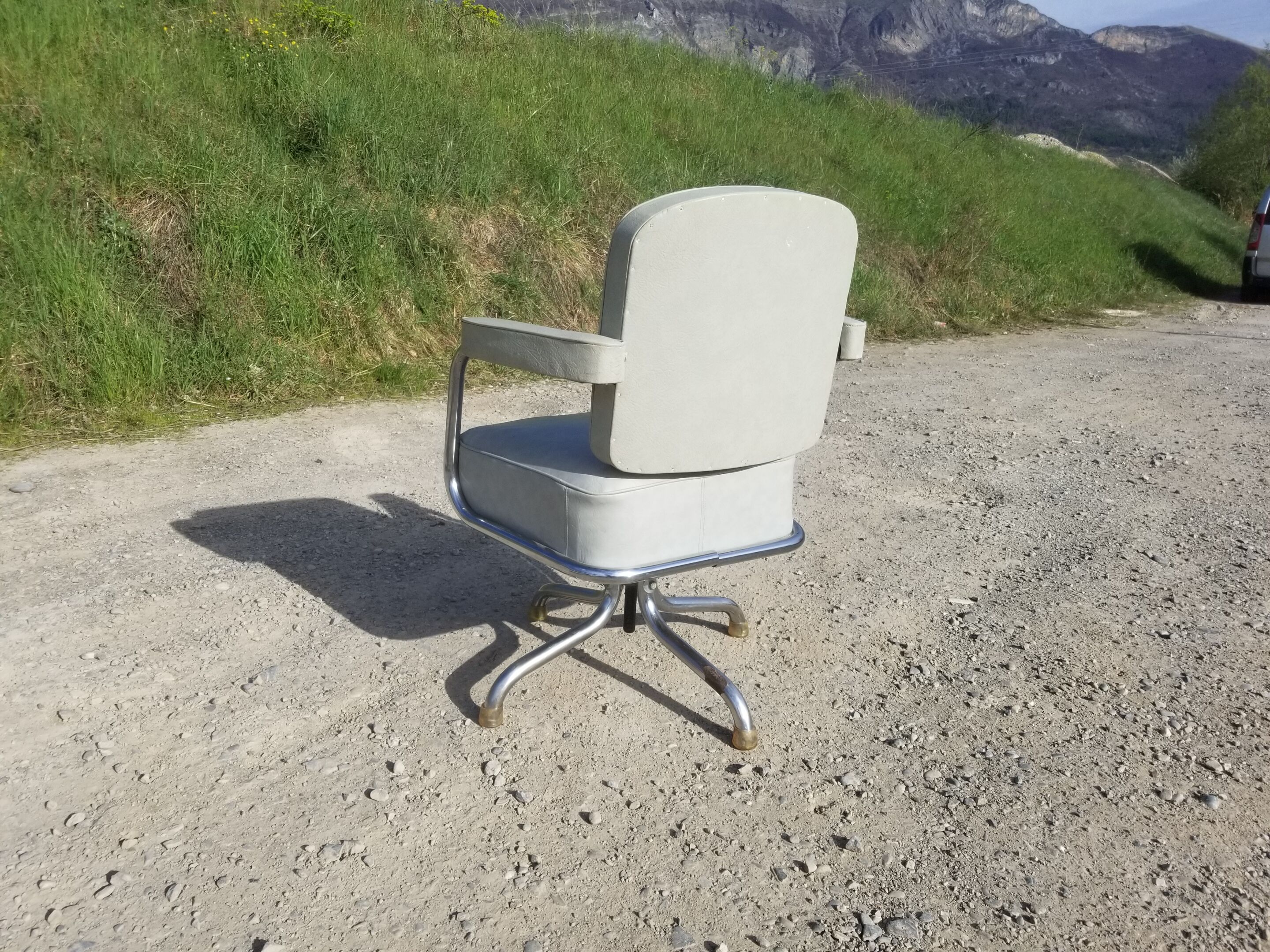 Old light grey pullman swivel office chair