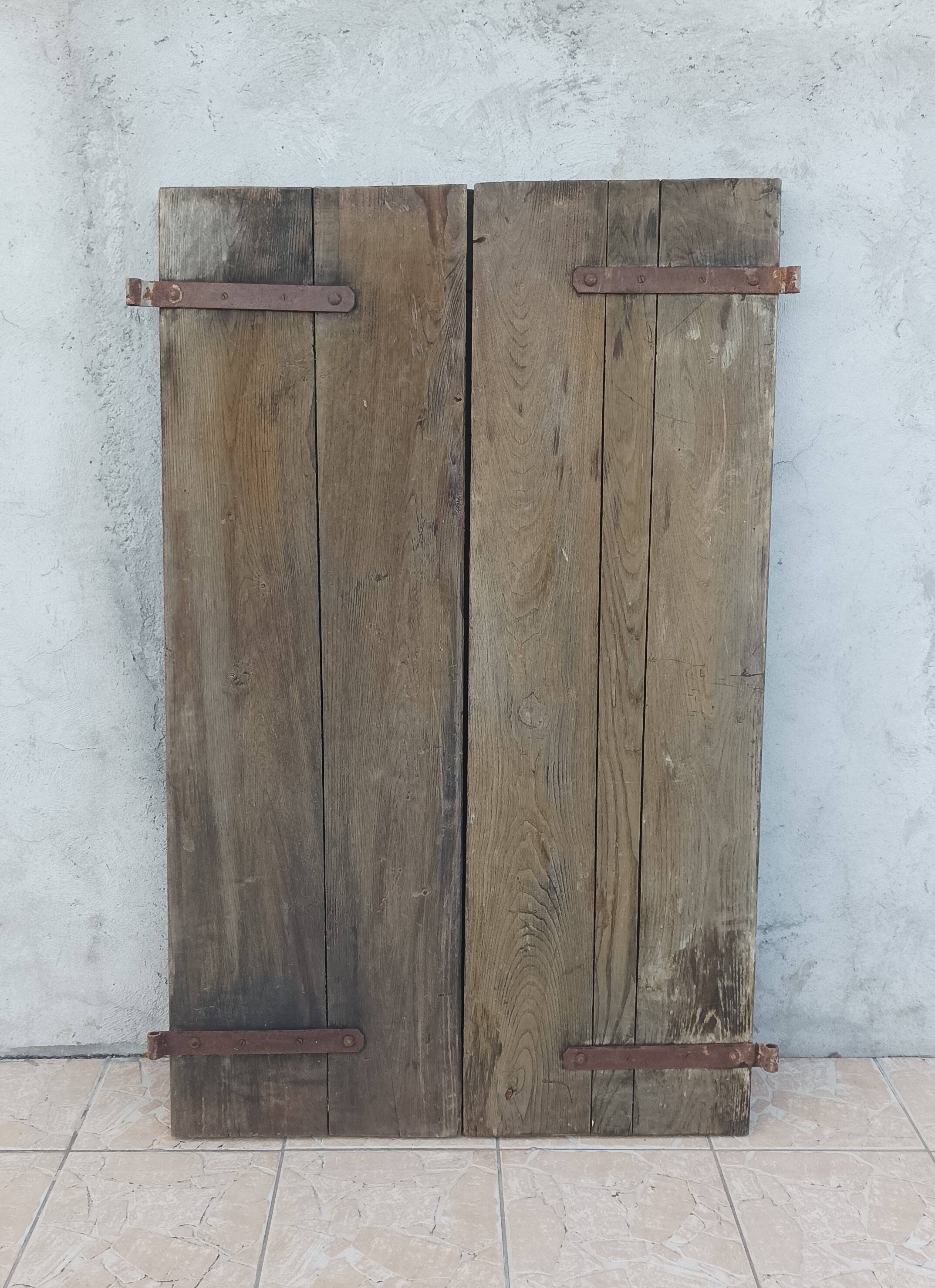 Pair of antique oak shutters