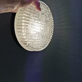 Ceiling light, in dark metallic paint with thick glass shade with beautiful details in the glass.