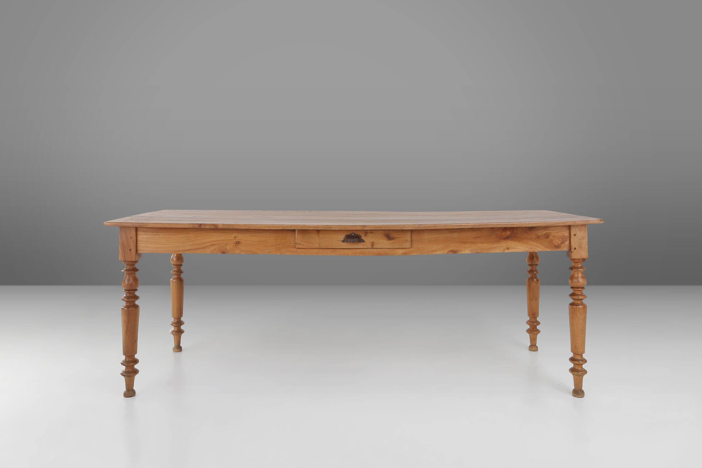 Wabi sabi style French dinner table in elm wood with drawer, ca. 1850