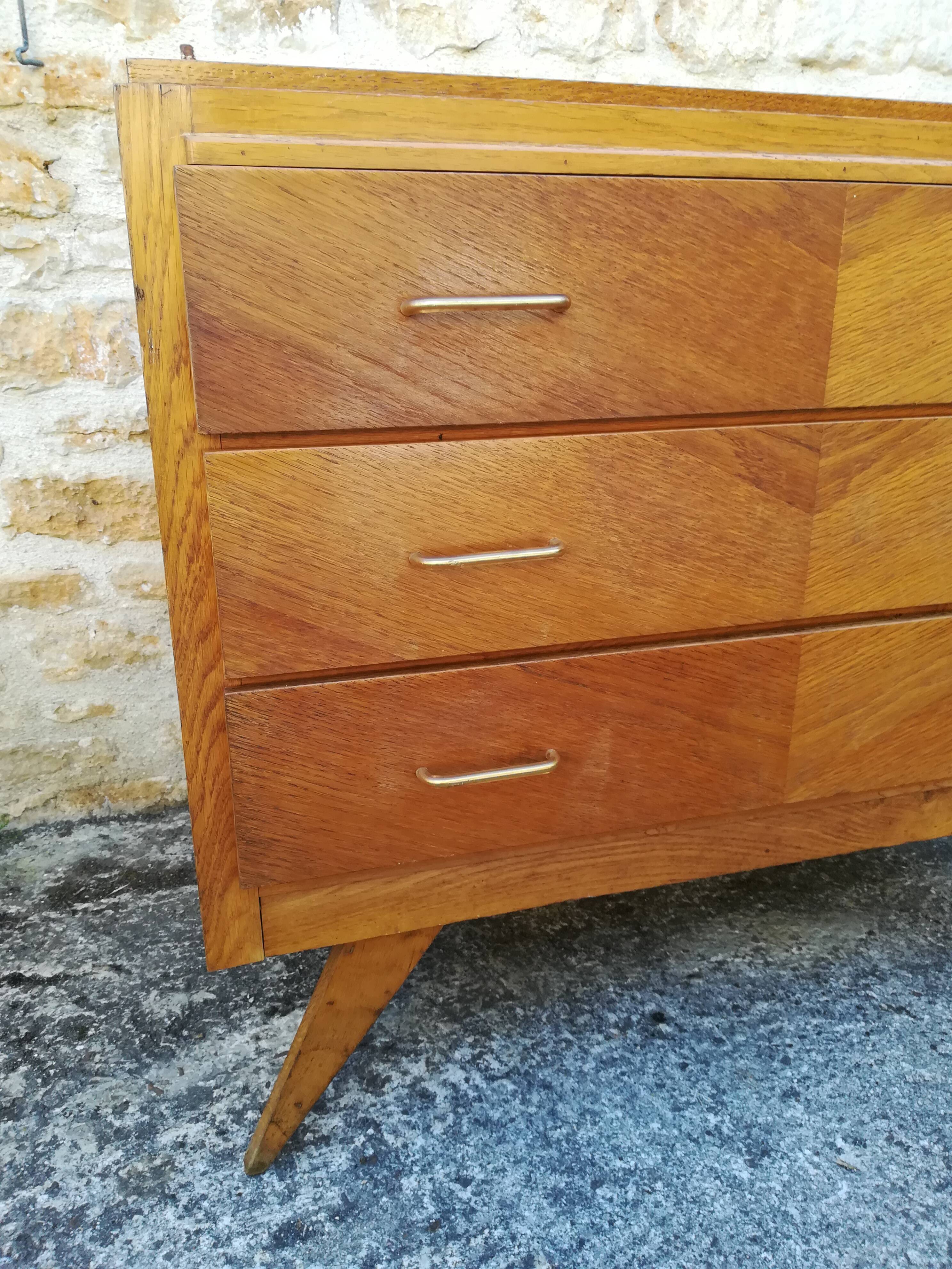 Compass feet chest of drawers