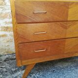 Compass feet chest of drawers