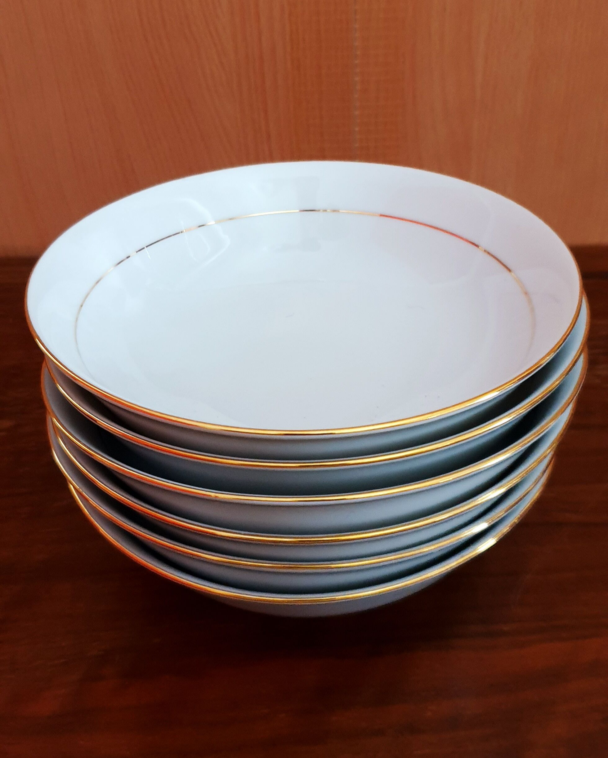 6 hollow plates gold edged in Limoges porcelain
