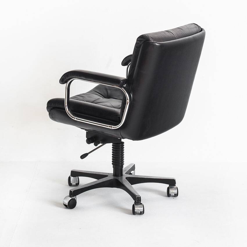 Vintage leather armchair. Swivel, on casters, multi-position. Norway, 1970s.