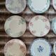 12 antique flat plates in ironstone