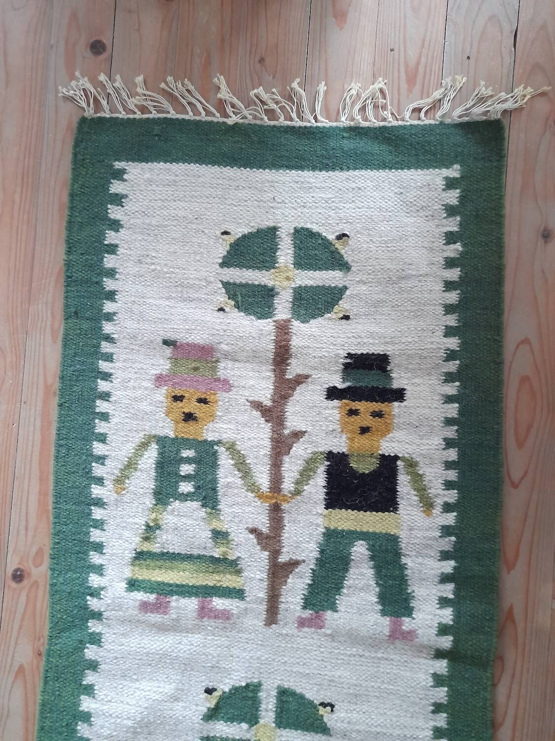 Small wool rug with a 70s Danish folk pattern.
