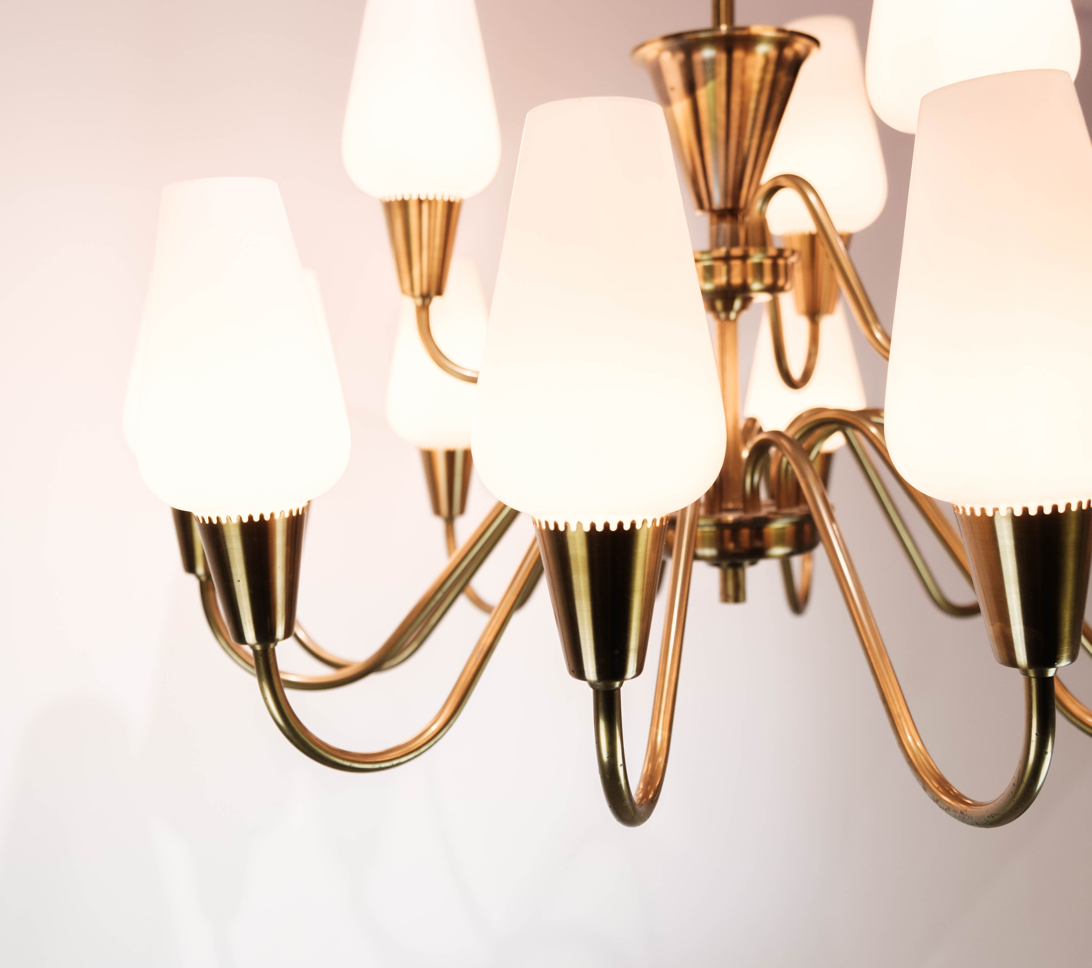 Lamp with arms of brass and glass, of Danish design from the 1950s