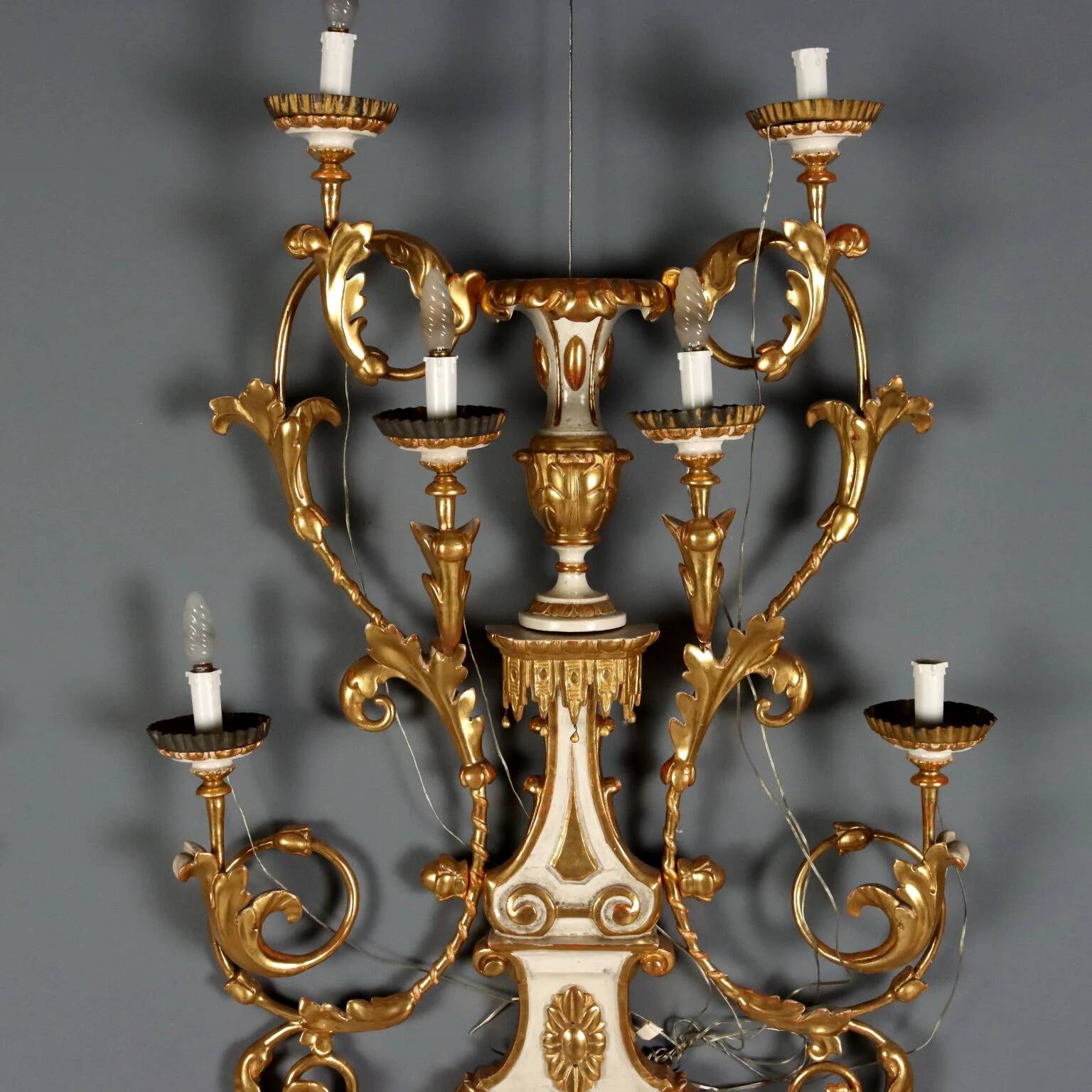 Antique wall sconces in wood and iron, Italy, mid-19th century.