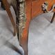 Louis XV bonheur du jour in rosewood marquetry decorated with bronze.