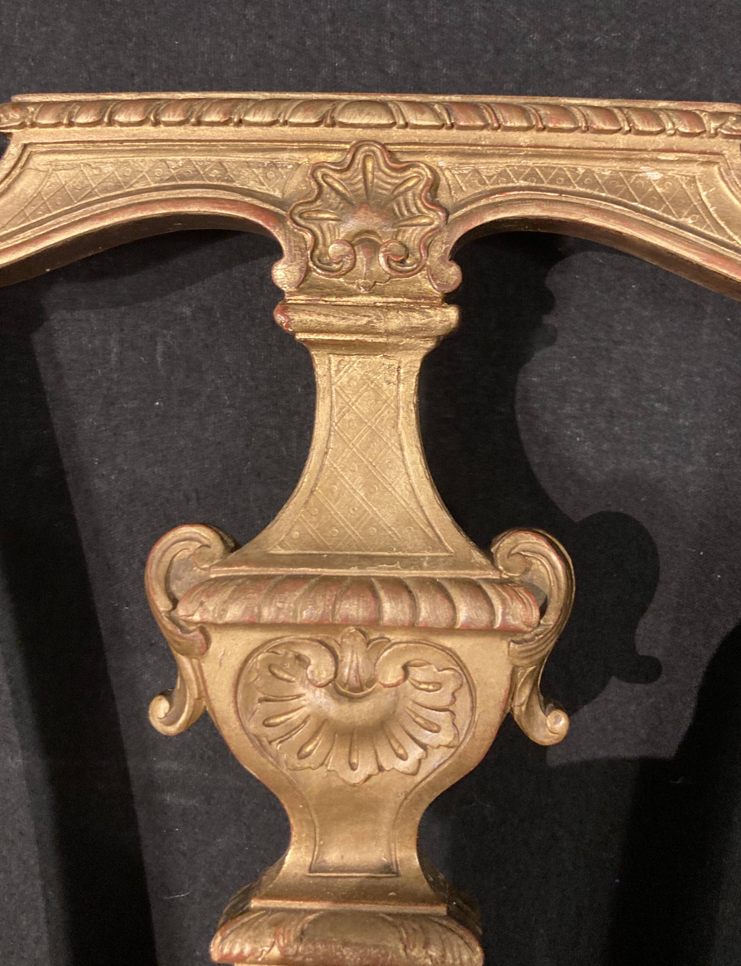 Pair of gilded wooden chairs